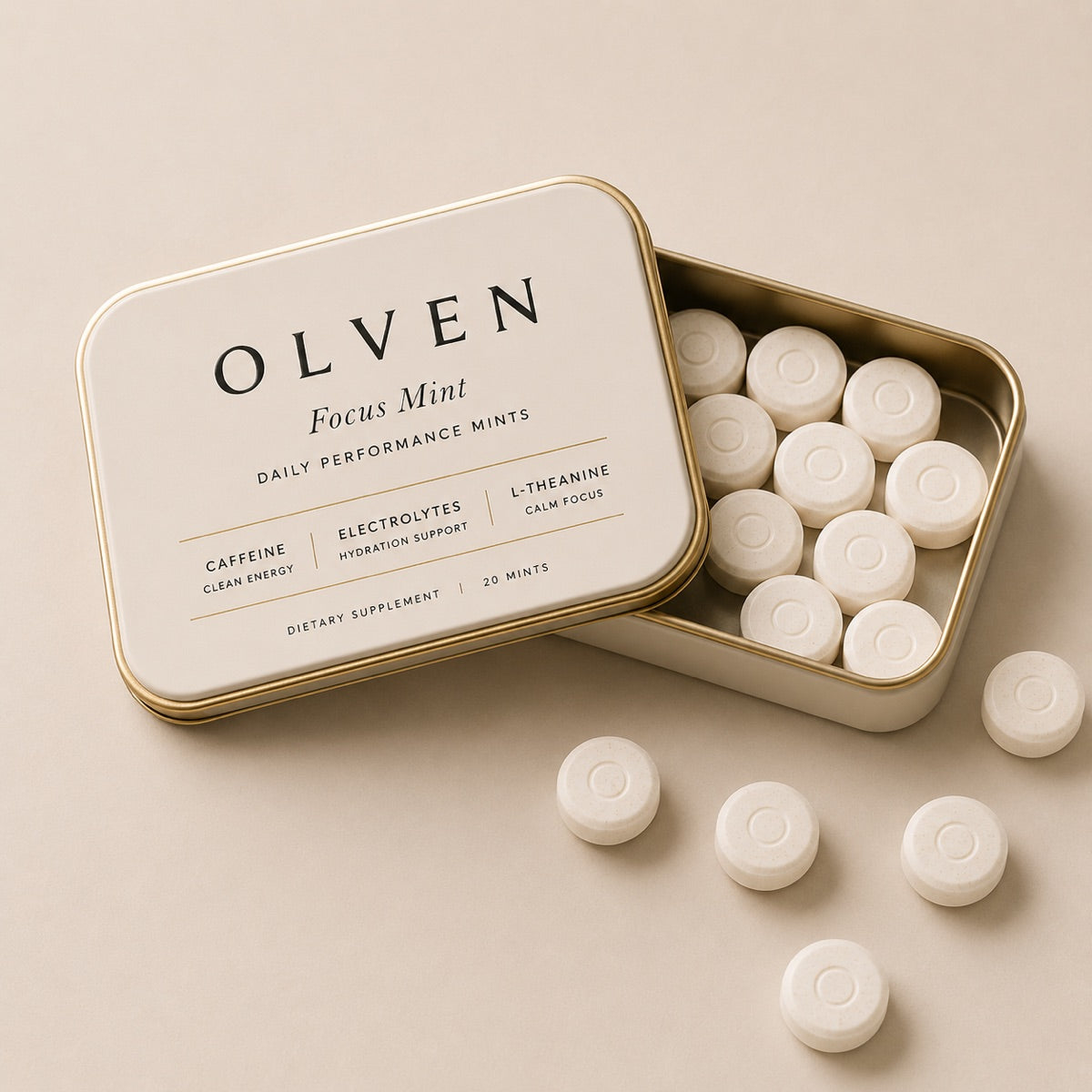 The Olven tin open, mints spilling onto the surface