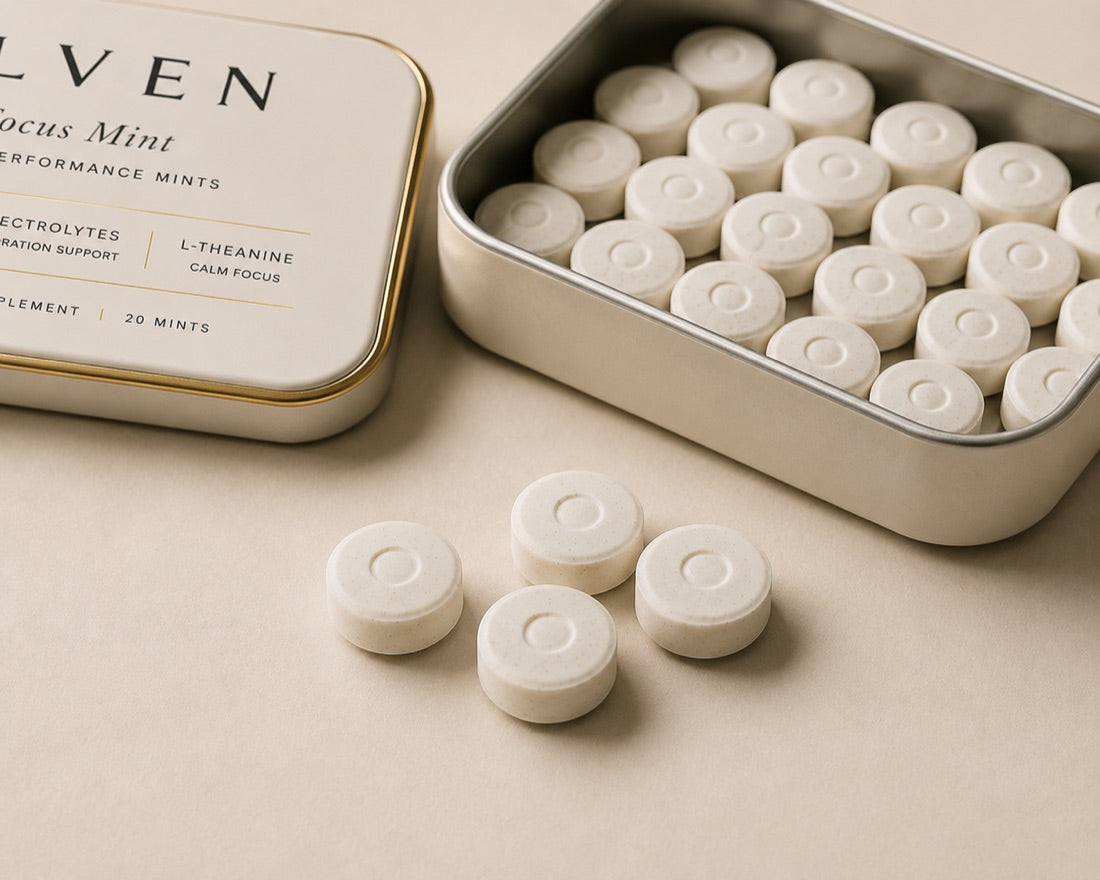 An open Olven tin beside its mints